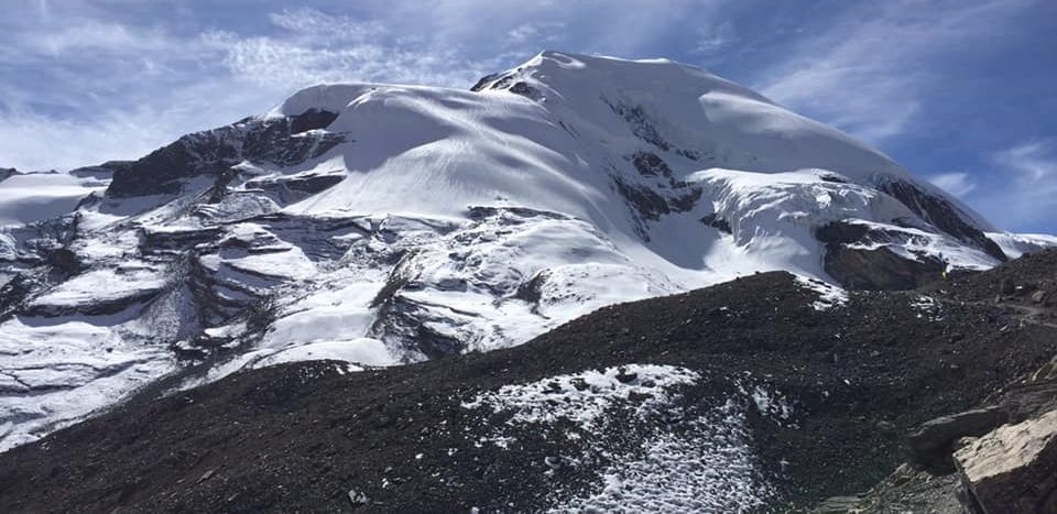 Tharong Peak ( Thorong Ri ) above Tharong La on crossing Tharong La high pass on Annapurna circuit trek in the Nepal Himalaya