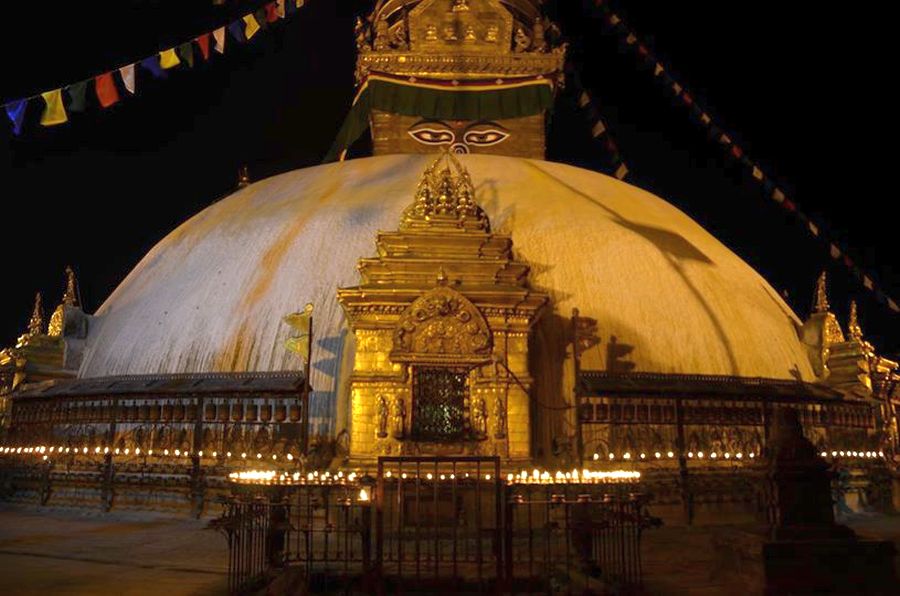 Buddhist Stupa at Bodnath ( Baudhanath ) illuminated at night in Kathmandu