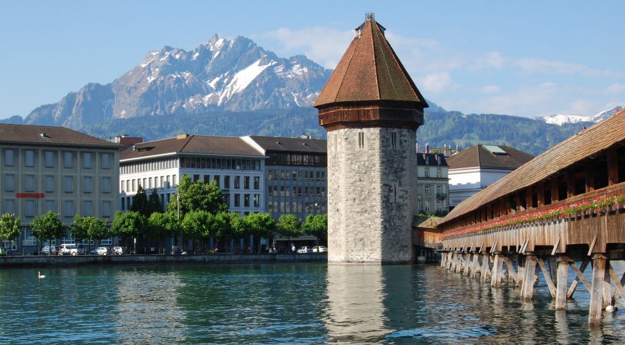 The Kapellbrcke ( Chapel Bridge ) across the River Reuss in Lucerne in central Switzerland