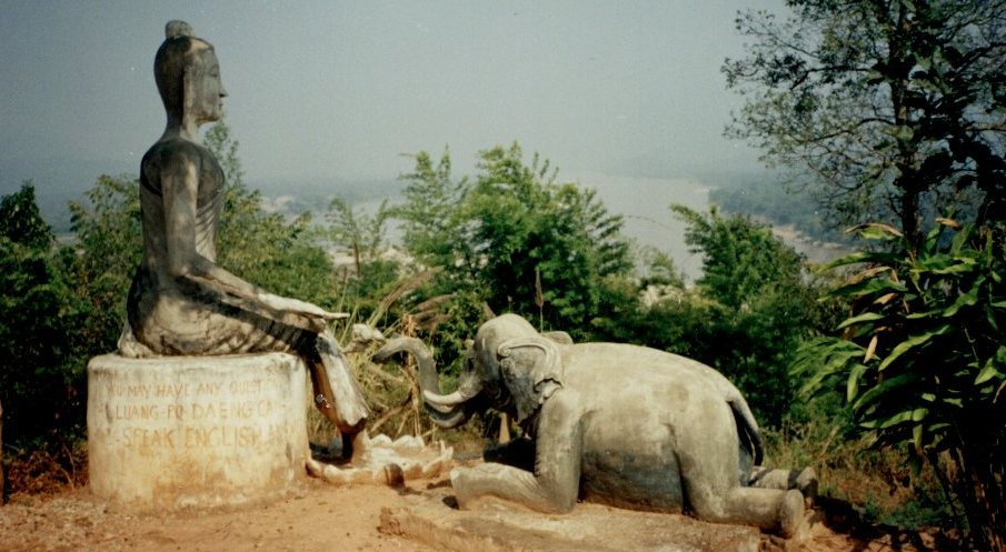 Statues at Thai Temple overlooking the Maekong River at the Golden Triangle border junction of Thailand, Laos and Burma ( Myanmar )